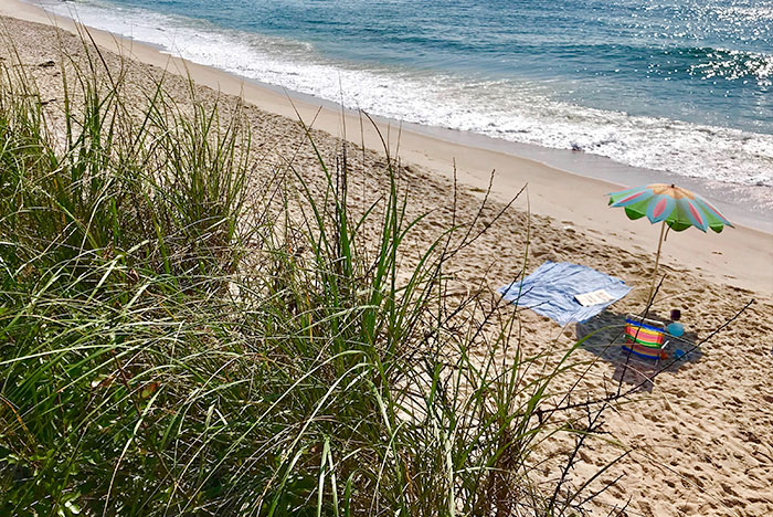 Image of person relaxing on the beach