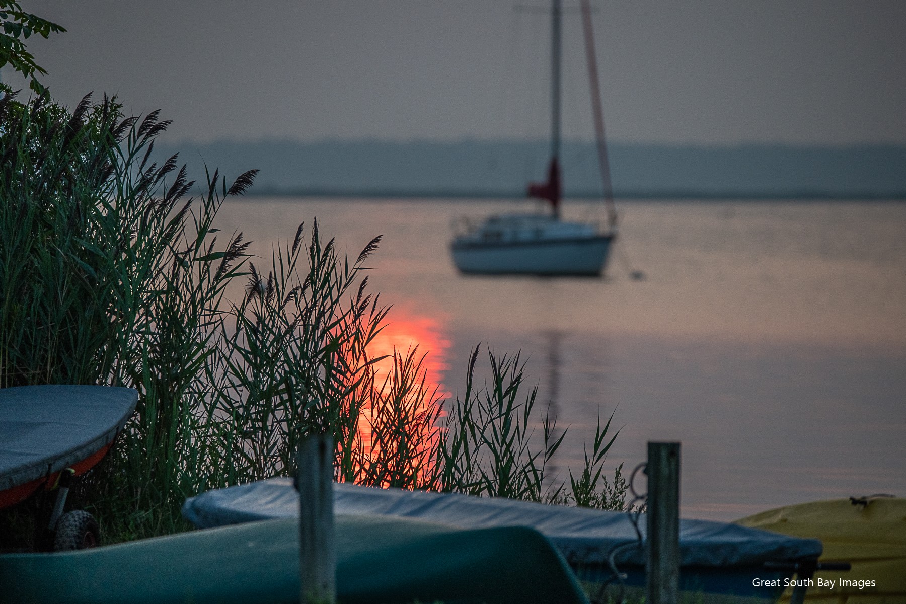 Boat on the water at sunset